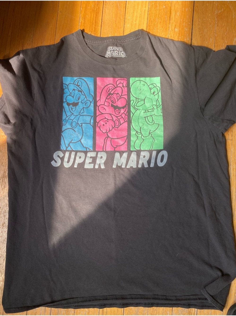 Nintendo Black Tee with Blue Pink Green Panels